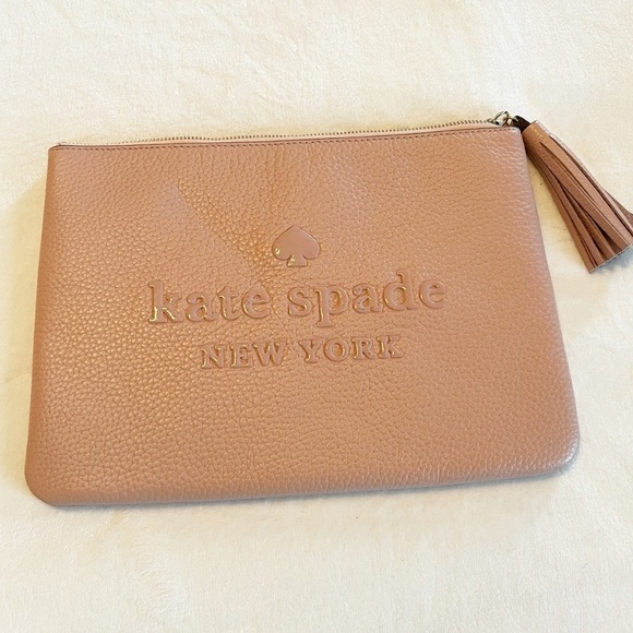 kate spade Handbags - Kate spade ♠️ large tassel pouch logo rose pink